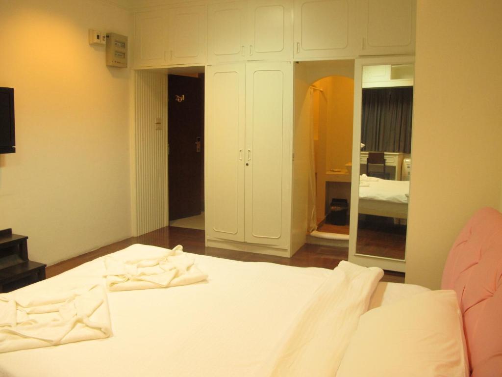 At One Inn Hualampong Бангкок Номер фото