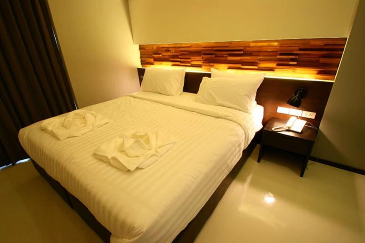 At One Inn Hualampong Бангкок Номер фото