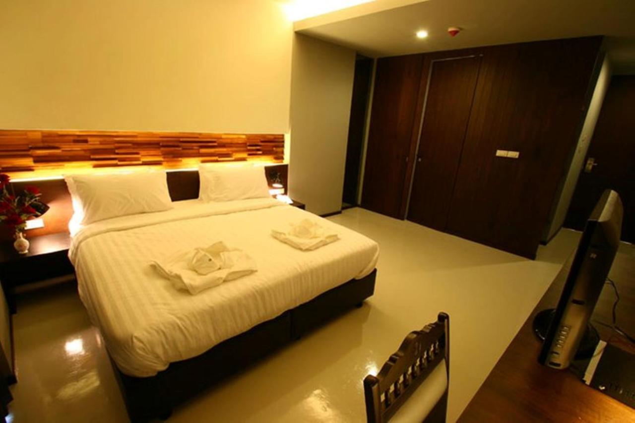 At One Inn Hualampong Бангкок Номер фото
