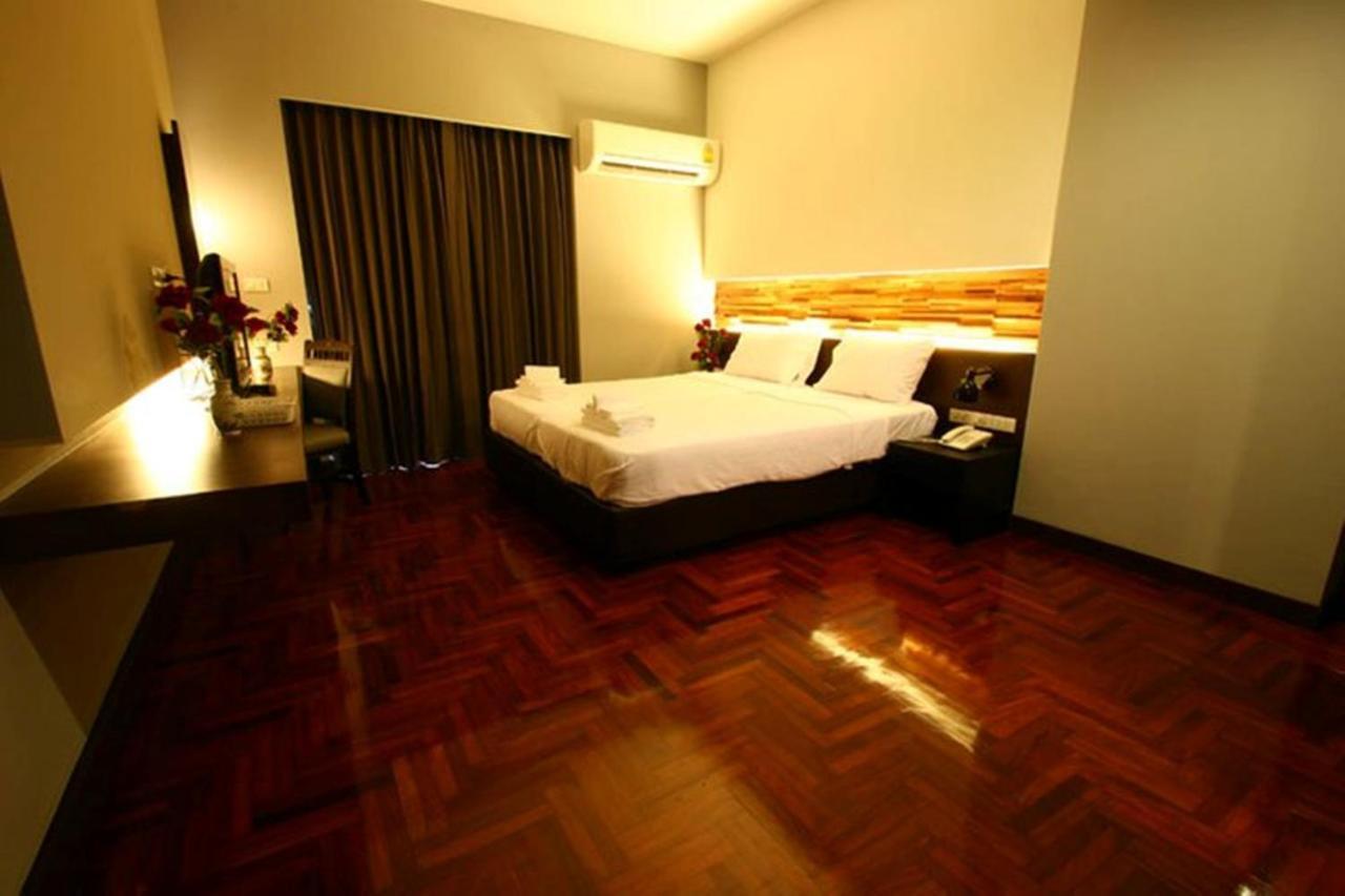 At One Inn Hualampong Бангкок Номер фото